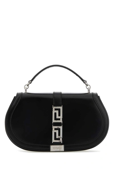Shop Versace Handbags. In Black