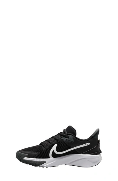 Shop Nike Kids' Star Runner 4 Sneaker In Black/ White/ Anthracite