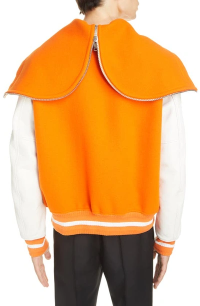 Shop Givenchy Mixed Media Logo Wool Blend Varsity Jacket In Orange