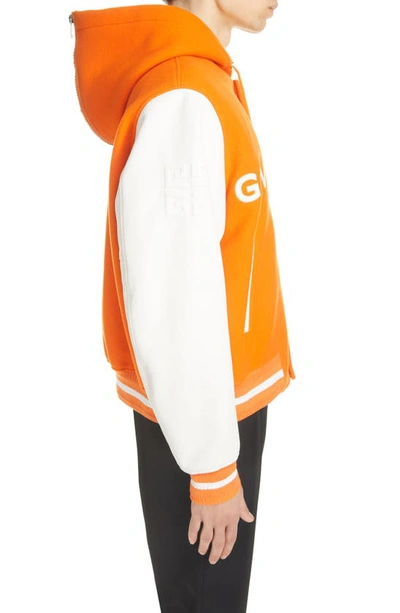 Shop Givenchy Mixed Media Logo Wool Blend Varsity Jacket In Orange