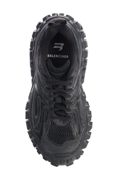 Shop Balenciaga Defender Low Top Sneaker In Black