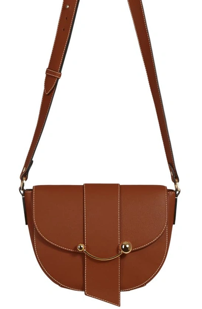 Shop Strathberry Crescent Saddle Leather Crossbody Bag In Chestnut/ Vanilla