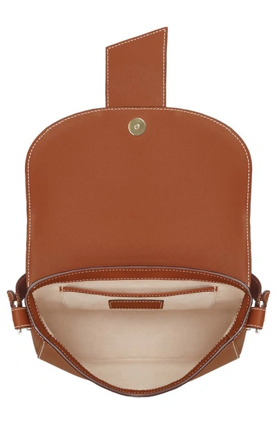 Shop Strathberry Crescent Saddle Leather Crossbody Bag In Chestnut/ Vanilla