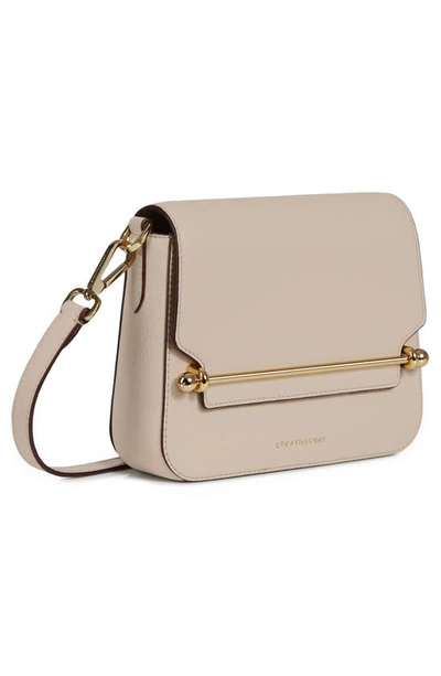 Shop Strathberry Ace Mini Leather Crossbody Bag In Oat