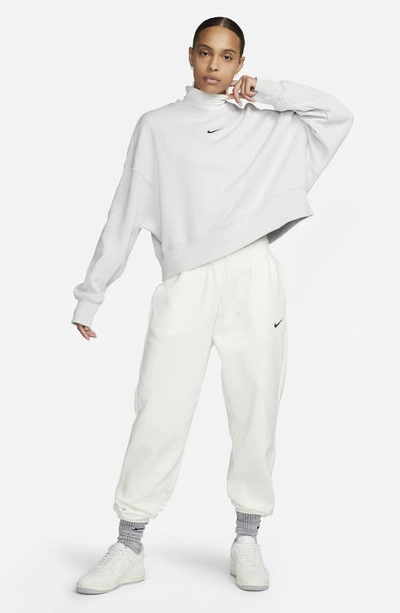 Shop Nike Phoenix Fleece Crewneck Sweatshirt In Photon Dust/ Black