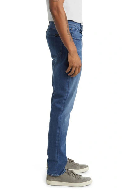 Shop 7 For All Mankind Slimmy Luxe Performance Plus Slim Fit Tapered Jeans In Mid Blue