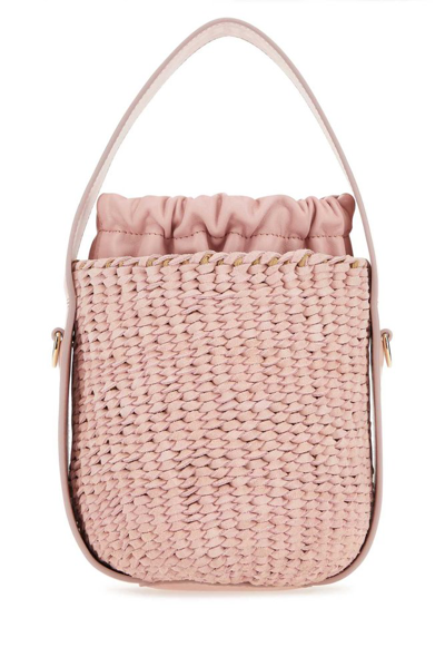 Shop Chloé Woven Bucket Bag In Pink