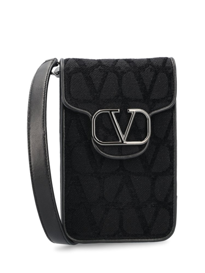 Shop Valentino Logo Plaque Foldover Top Shoulder Bag In Black