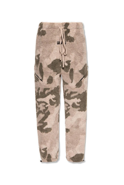 Shop Essentials Fear Of God  Camouflage Printed Fleece Trousers In Beige