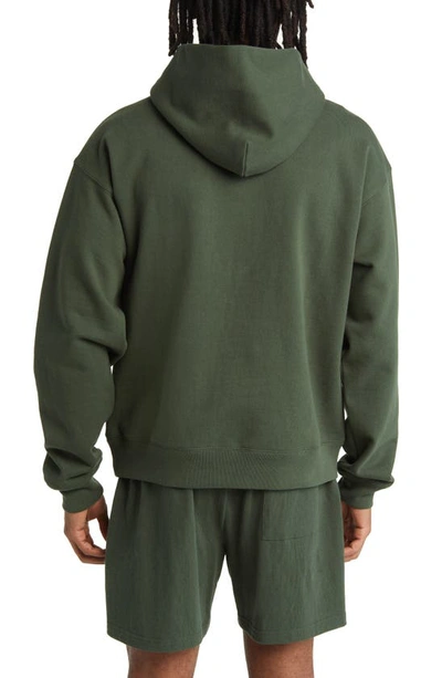 Shop Museum Of Peace And Quiet Signature Cotton Graphic Hoodie In Forest