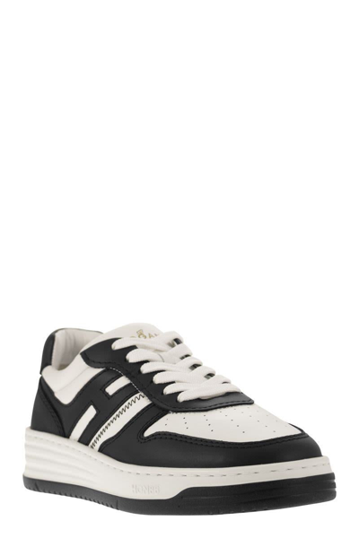 Shop Hogan Sneakers H630 In White/black