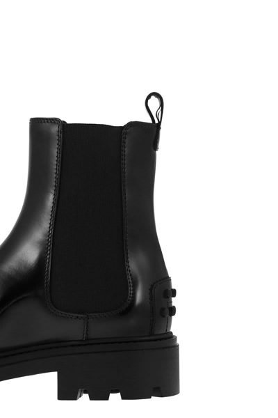 Shop Tod's Leather Chelsea Boot In Black
