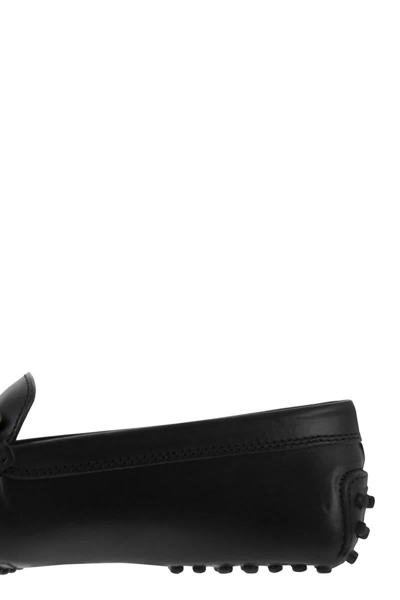 Shop Tod's Moccasin With Metal Chain In Black