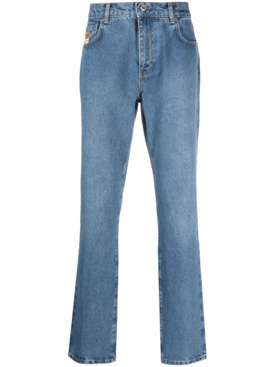 Shop Moschino Cotton Jeans In Denim