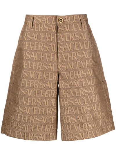 Versace Knee-length Shorts In All-over Pattern In Brown