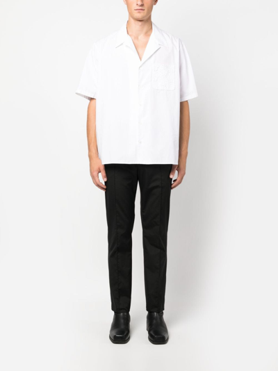 Shop Valentino Straight-leg Drawstring Cotton Trousers In Black