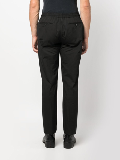 Shop Valentino Straight-leg Drawstring Cotton Trousers In Black