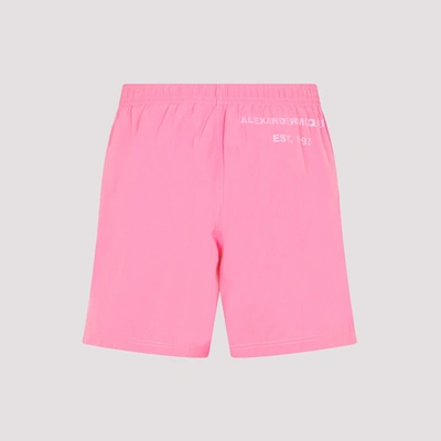 Shop Alexander Mcqueen Swim Shorts Swimwear In Pink &amp; Purple