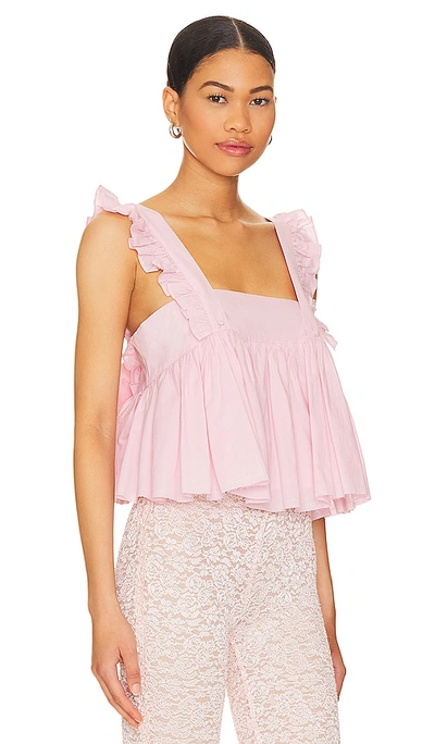 Shop Selkie The Ruffle Apron Top In Pink