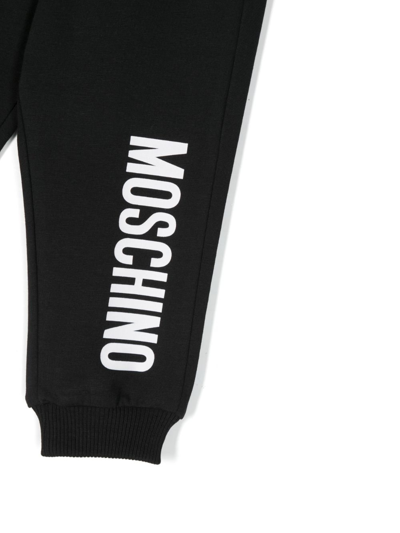 Shop Moschino Logo-print Tapered Track Pants In Black