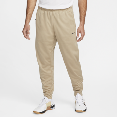 Shop Nike Men's  Therma Therma-fit Tapered Fitness Pants In Brown