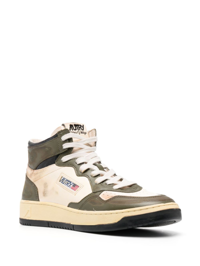Shop Autry Hi-top Leather Sneakers In Green