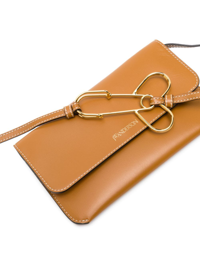 Shop Jw Anderson Phone Leather Pouch Bag In Brown