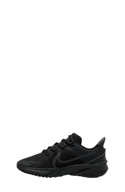 Shop Nike Kids' Star Runner 4 Sneaker In Black/ Black/ Anthracite