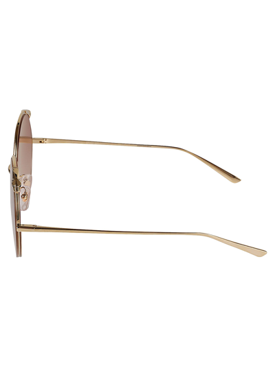 Shop Cartier Round Classic Sunglasses In Gold