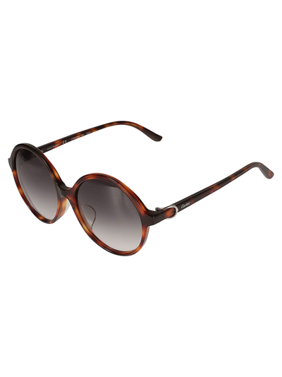 Shop Cartier Round Frame Logo Sunglasses In N/a