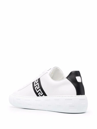 Shop Versace Greca Low-top Sneakers In Black