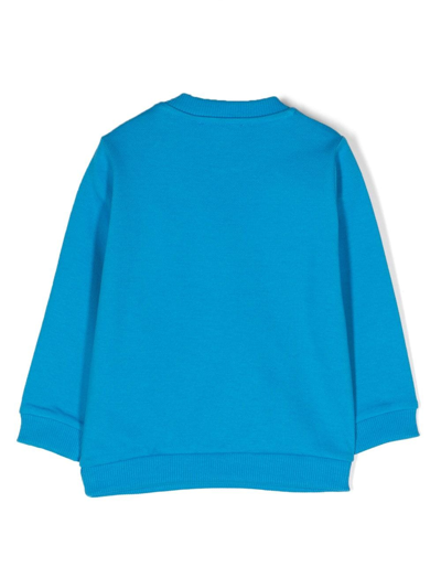 Shop Moschino Leo Teddy-print Jersey-fleece Sweatshirt In Blue