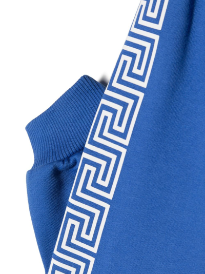 Shop Versace Greca-pattern Cotton Track Pants In Blue