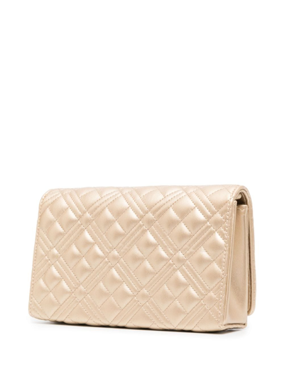 Shop Love Moschino Logo-lettering Quilted Crossbody Bag In Gold