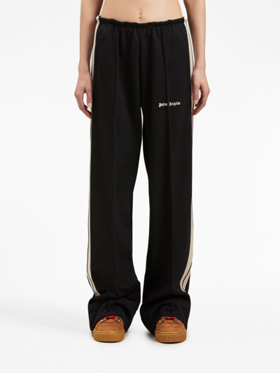 Shop Palm Angels Stripe-detail Loose-fit Track Pants In Black