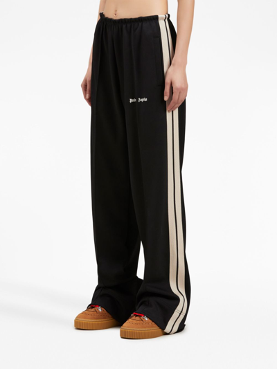 Shop Palm Angels Stripe-detail Loose-fit Track Pants In Black