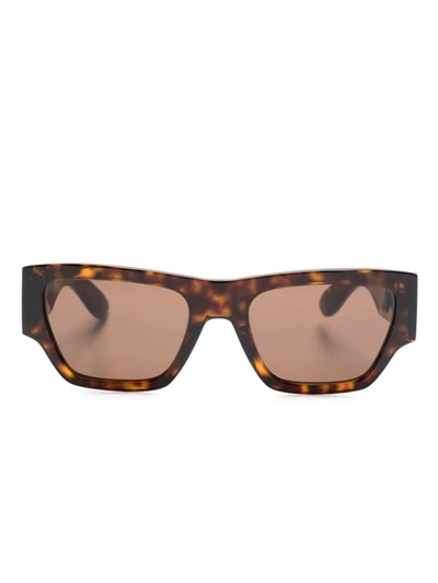 Shop Alexander Mcqueen Sunglasses In Brown