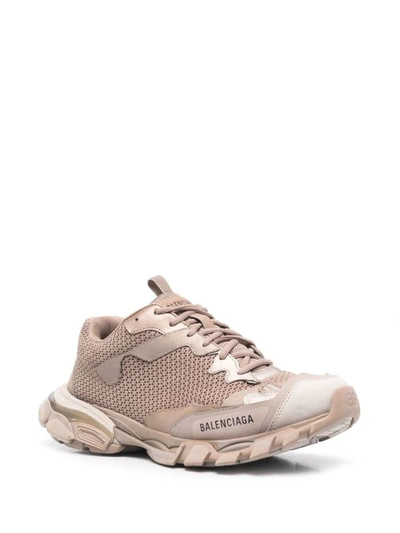 Shop Balenciaga Destroyed Track Sneakers In Beige