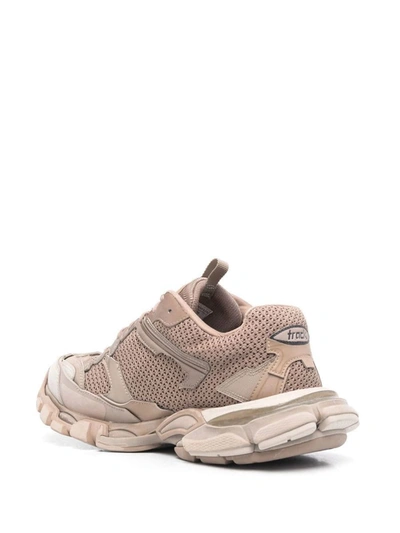 Shop Balenciaga Destroyed Track Sneakers In Beige