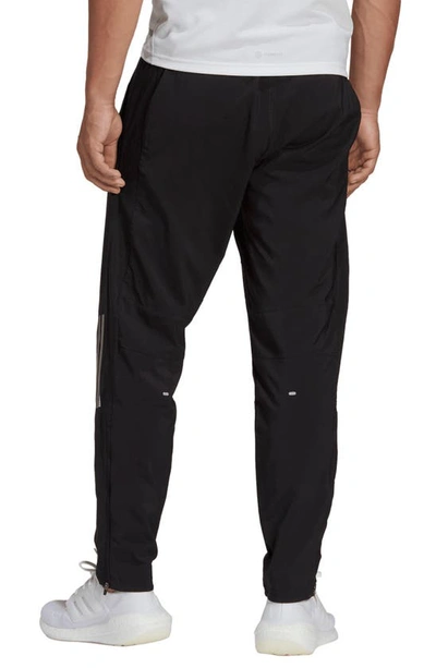 Shop Adidas Originals Own The Run Astro Pants In Black