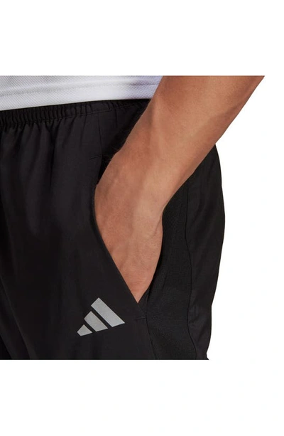 Shop Adidas Originals Own The Run Astro Pants In Black