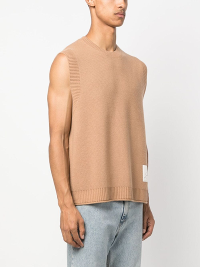Jw Anderson Logo-patch Sleeveless Vest In Brown