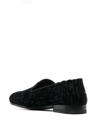 Shop Moschino Logo-pattern Print Loafers In Black