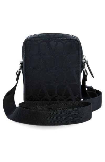 Shop Valentino Small Logo Canvas Crossbody Bag In 0no-nero