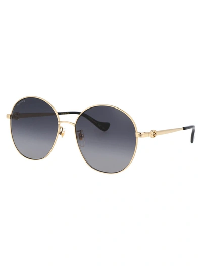 Shop Gucci Sunglasses In 001 Gold Gold Grey
