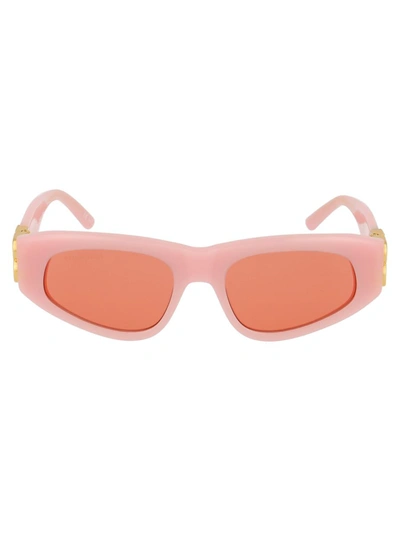 Shop Balenciaga Sunglasses In 003 Pink Gold Red