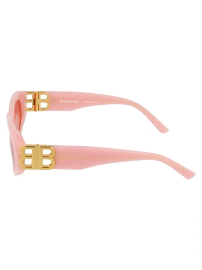 Shop Balenciaga Sunglasses In 003 Pink Gold Red