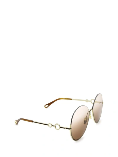 Shop Chloé Sunglasses In Gold