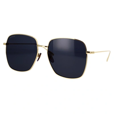 Shop Gucci Eyewear Sunglasses In Gold