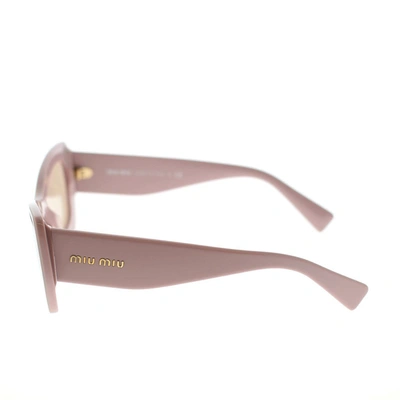 Shop Miu Miu Eyewear Sunglasses In Pink